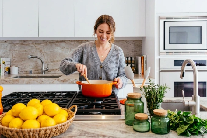 Woman cooking with quality kitchen tools